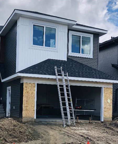 Roofing installation for new home construction in Edmonton and Calgary.